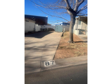 Check out this extra deep RV lot with a privacy wall in the back on Green Spring Country Club in Utah - for sale on GolfHomes.com, golf home, golf lot