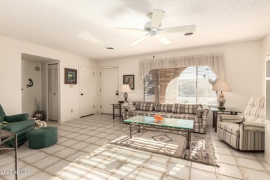 This gorgeous single-story home awaits you in the desirable 55+ on Fountain of the Sun Country Club in Arizona - for sale on GolfHomes.com, golf home, golf lot