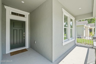 Better Than New - Modern Elegance with Premium Upgrades in on Halifax Plantation Golf Club in Florida - for sale on GolfHomes.com, golf home, golf lot