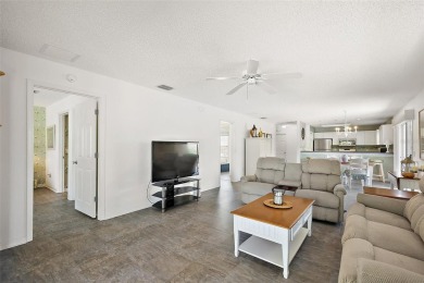 Welcome to this WATERFRONT 2/2 Marathon Courtyard Villa with a on The Links of Spruce Creek in Florida - for sale on GolfHomes.com, golf home, golf lot