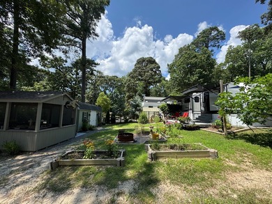 Nice corner lot with septic.  2022 one bedroom camper in on Captains Cove Golf and Yacht Club in Virginia - for sale on GolfHomes.com, golf home, golf lot