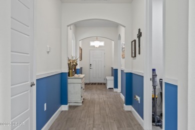 Better Than New - Modern Elegance with Premium Upgrades in on Halifax Plantation Golf Club in Florida - for sale on GolfHomes.com, golf home, golf lot