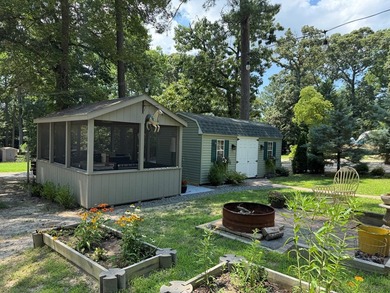 Nice corner lot with septic.  2022 one bedroom camper in on Captains Cove Golf and Yacht Club in Virginia - for sale on GolfHomes.com, golf home, golf lot