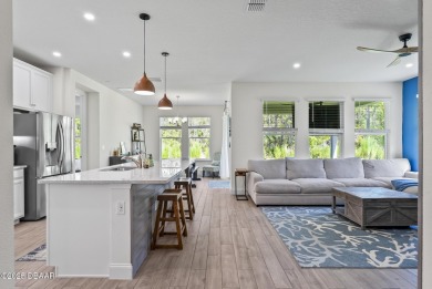 Better Than New - Modern Elegance with Premium Upgrades in on Halifax Plantation Golf Club in Florida - for sale on GolfHomes.com, golf home, golf lot
