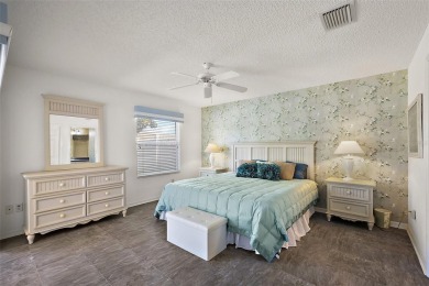 Welcome to this WATERFRONT 2/2 Marathon Courtyard Villa with a on The Links of Spruce Creek in Florida - for sale on GolfHomes.com, golf home, golf lot