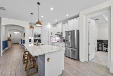 Better Than New - Modern Elegance with Premium Upgrades in on Halifax Plantation Golf Club in Florida - for sale on GolfHomes.com, golf home, golf lot