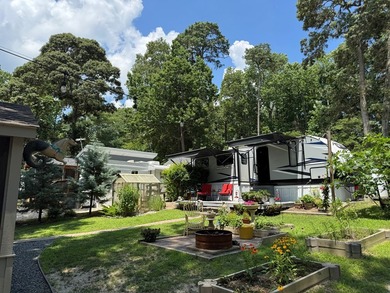 Nice corner lot with septic.  2022 one bedroom camper in on Captains Cove Golf and Yacht Club in Virginia - for sale on GolfHomes.com, golf home, golf lot