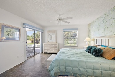 Welcome to this WATERFRONT 2/2 Marathon Courtyard Villa with a on The Links of Spruce Creek in Florida - for sale on GolfHomes.com, golf home, golf lot