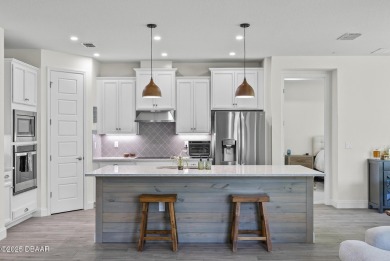Better Than New - Modern Elegance with Premium Upgrades in on Halifax Plantation Golf Club in Florida - for sale on GolfHomes.com, golf home, golf lot