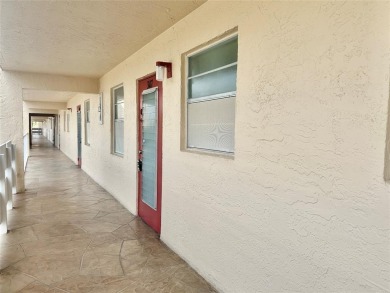 Discover easy South Florida living in this beautifully updated on Oriole Golf and Tennis Club in Florida - for sale on GolfHomes.com, golf home, golf lot