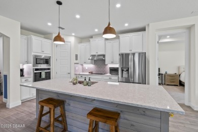 Better Than New - Modern Elegance with Premium Upgrades in on Halifax Plantation Golf Club in Florida - for sale on GolfHomes.com, golf home, golf lot