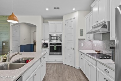 Better Than New - Modern Elegance with Premium Upgrades in on Halifax Plantation Golf Club in Florida - for sale on GolfHomes.com, golf home, golf lot
