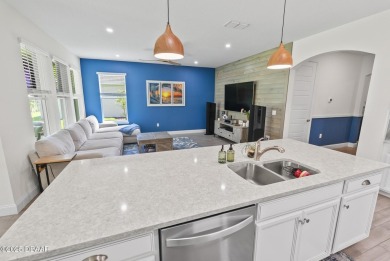 Better Than New - Modern Elegance with Premium Upgrades in on Halifax Plantation Golf Club in Florida - for sale on GolfHomes.com, golf home, golf lot