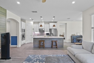 Better Than New - Modern Elegance with Premium Upgrades in on Halifax Plantation Golf Club in Florida - for sale on GolfHomes.com, golf home, golf lot