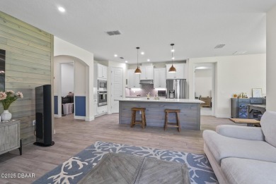 Better Than New - Modern Elegance with Premium Upgrades in on Halifax Plantation Golf Club in Florida - for sale on GolfHomes.com, golf home, golf lot