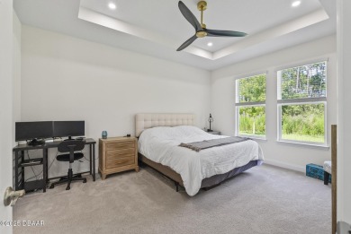 Better Than New - Modern Elegance with Premium Upgrades in on Halifax Plantation Golf Club in Florida - for sale on GolfHomes.com, golf home, golf lot