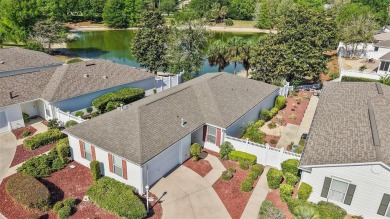 Welcome to this WATERFRONT 2/2 Marathon Courtyard Villa with a on The Links of Spruce Creek in Florida - for sale on GolfHomes.com, golf home, golf lot