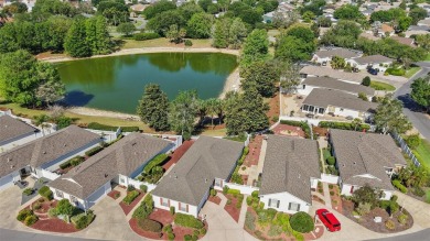 Welcome to this WATERFRONT 2/2 Marathon Courtyard Villa with a on The Links of Spruce Creek in Florida - for sale on GolfHomes.com, golf home, golf lot