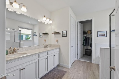 Better Than New - Modern Elegance with Premium Upgrades in on Halifax Plantation Golf Club in Florida - for sale on GolfHomes.com, golf home, golf lot