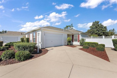 Welcome to this WATERFRONT 2/2 Marathon Courtyard Villa with a on The Links of Spruce Creek in Florida - for sale on GolfHomes.com, golf home, golf lot