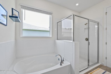 Better Than New - Modern Elegance with Premium Upgrades in on Halifax Plantation Golf Club in Florida - for sale on GolfHomes.com, golf home, golf lot