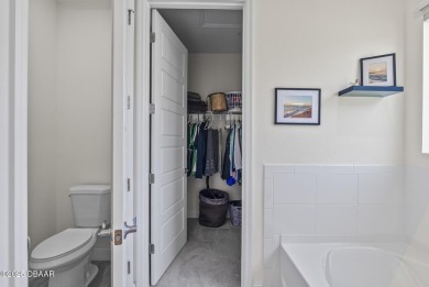 Better Than New - Modern Elegance with Premium Upgrades in on Halifax Plantation Golf Club in Florida - for sale on GolfHomes.com, golf home, golf lot