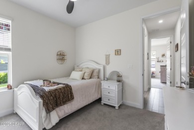 Better Than New - Modern Elegance with Premium Upgrades in on Halifax Plantation Golf Club in Florida - for sale on GolfHomes.com, golf home, golf lot
