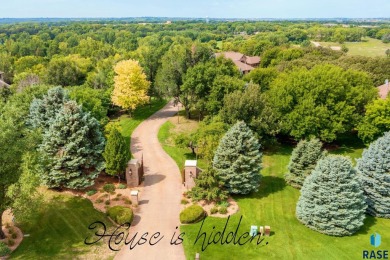 This exceptional, approximately 10,483 square foot home is on Brandon Municipal Golf Course in South Dakota - for sale on GolfHomes.com, golf home, golf lot