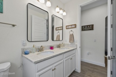Better Than New - Modern Elegance with Premium Upgrades in on Halifax Plantation Golf Club in Florida - for sale on GolfHomes.com, golf home, golf lot