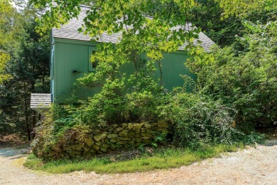 Tucked at the end of a quiet cul-de-sac, this post-and-beam cape on Eastman Golf Links in New Hampshire - for sale on GolfHomes.com, golf home, golf lot
