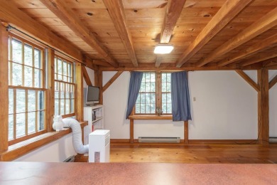 Tucked at the end of a quiet cul-de-sac, this post-and-beam cape on Eastman Golf Links in New Hampshire - for sale on GolfHomes.com, golf home, golf lot