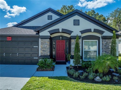 Step into modern comfort and style with this stunning 4-bedroom on Lexington Oaks Golf Club in Florida - for sale on GolfHomes.com, golf home, golf lot