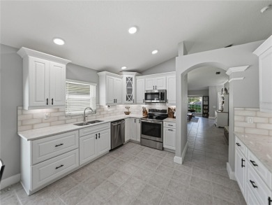 Step into modern comfort and style with this stunning 4-bedroom on Lexington Oaks Golf Club in Florida - for sale on GolfHomes.com, golf home, golf lot