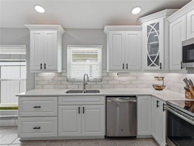 Step into modern comfort and style with this stunning 4-bedroom on Lexington Oaks Golf Club in Florida - for sale on GolfHomes.com, golf home, golf lot