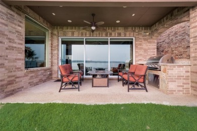 Stunning custom, lakefront home located in the 24 hr gated & on The Golf Club at Resort Eagle Mountain Lake in Texas - for sale on GolfHomes.com, golf home, golf lot