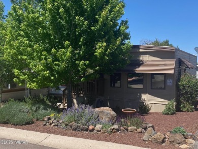 GREAT PRICE! GREAT LOCATION! This charming Park Model features a on Juniper Ridge R.V. Golf Resort in Arizona - for sale on GolfHomes.com, golf home, golf lot