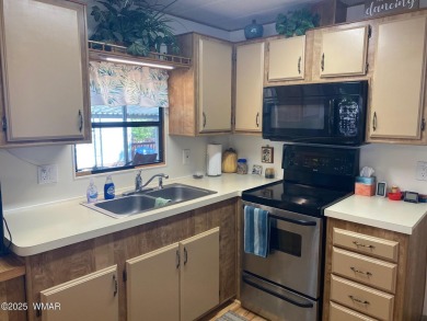 GREAT PRICE! GREAT LOCATION! This charming Park Model features a on Juniper Ridge R.V. Golf Resort in Arizona - for sale on GolfHomes.com, golf home, golf lot