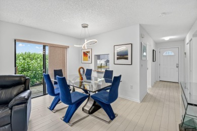 Welcome to your charming first-floor corner unit with beautiful on Hunters Run Golf and Country Club in Florida - for sale on GolfHomes.com, golf home, golf lot