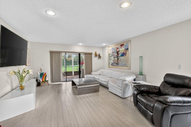 Welcome to your charming first-floor corner unit with beautiful on Hunters Run Golf and Country Club in Florida - for sale on GolfHomes.com, golf home, golf lot