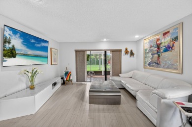 Welcome to your charming first-floor corner unit with beautiful on Hunters Run Golf and Country Club in Florida - for sale on GolfHomes.com, golf home, golf lot
