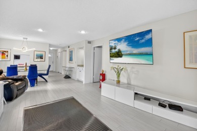 Welcome to your charming first-floor corner unit with beautiful on Hunters Run Golf and Country Club in Florida - for sale on GolfHomes.com, golf home, golf lot