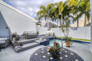 This is the tranquil winter retreat or full time home you've on PGA National Golf Club in Florida - for sale on GolfHomes.com, golf home, golf lot