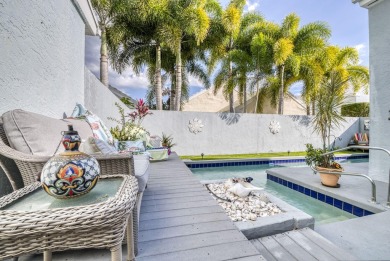 This is the tranquil winter retreat or full time home you've on PGA National Golf Club in Florida - for sale on GolfHomes.com, golf home, golf lot