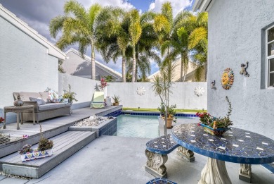 This is the tranquil winter retreat or full time home you've on PGA National Golf Club in Florida - for sale on GolfHomes.com, golf home, golf lot
