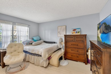 Welcome to your charming first-floor corner unit with beautiful on Hunters Run Golf and Country Club in Florida - for sale on GolfHomes.com, golf home, golf lot