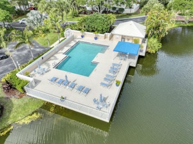 This is the tranquil winter retreat or full time home you've on PGA National Golf Club in Florida - for sale on GolfHomes.com, golf home, golf lot