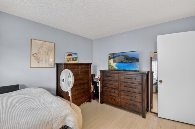 Welcome to your charming first-floor corner unit with beautiful on Hunters Run Golf and Country Club in Florida - for sale on GolfHomes.com, golf home, golf lot