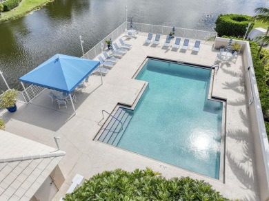 This is the tranquil winter retreat or full time home you've on PGA National Golf Club in Florida - for sale on GolfHomes.com, golf home, golf lot