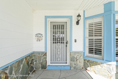 Step into this bright and inviting home featuring a formal on Timber Pines Golf Course in Florida - for sale on GolfHomes.com, golf home, golf lot
