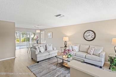 Step into this bright and inviting home featuring a formal on Timber Pines Golf Course in Florida - for sale on GolfHomes.com, golf home, golf lot